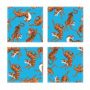 Tigers Dancing on Blue Background and Orange Animal Print Champs on Fading or Gradient Background