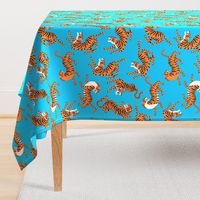 Tigers Dancing on Blue Background and Orange Animal Print Champs on Fading or Gradient Background