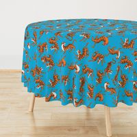 Tigers Dancing on Blue Background and Orange Animal Print Champs on Fading or Gradient Background