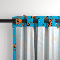 Tigers Dancing on Blue Background and Orange Animal Print Champs on Fading or Gradient Background