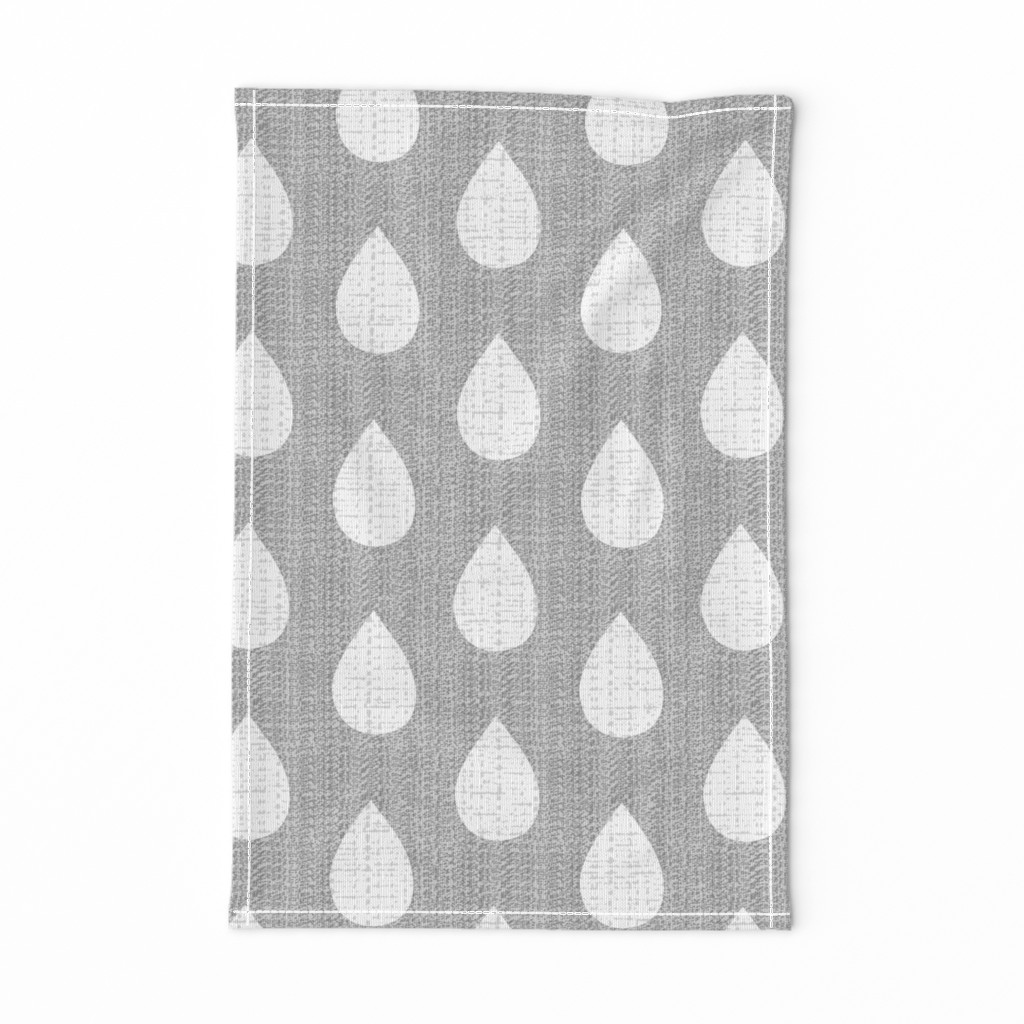 Raindrops on gray flannel