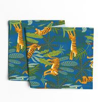 Tiger Dancing in the Jungle on Blue Background,Gold Orange and Black Animal Print Champs on Fading or Gradient Background