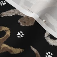 Trotting Lagotto Romagnolo and paw prints - black