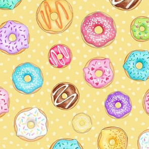 Scattered Rainbow Donuts on lemon yellow spotty