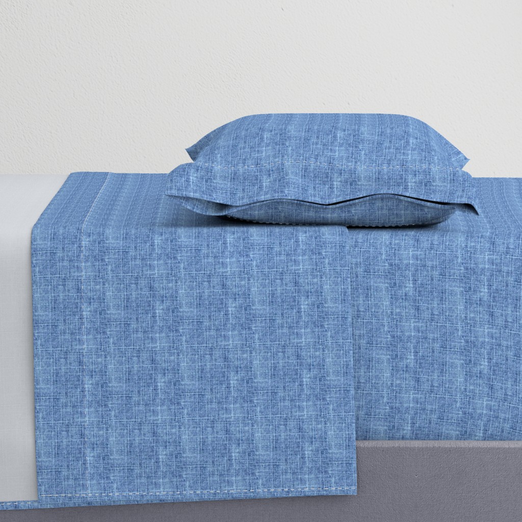 classic blue linen textured fabric or wallpaper