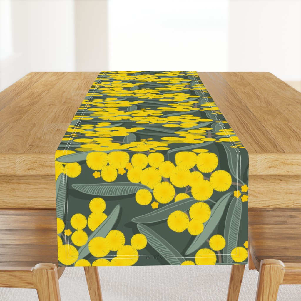 golden wattle on dark green