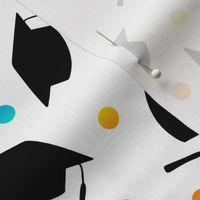 Tossed Graduation Caps in Black with Rainbow Confetti
