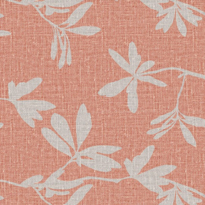 Natural leaves on peach coloured linen