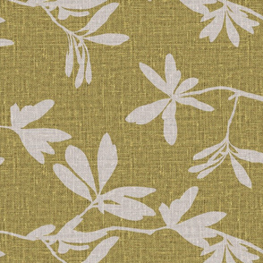 Natural leaves on chartreuse coloured linen