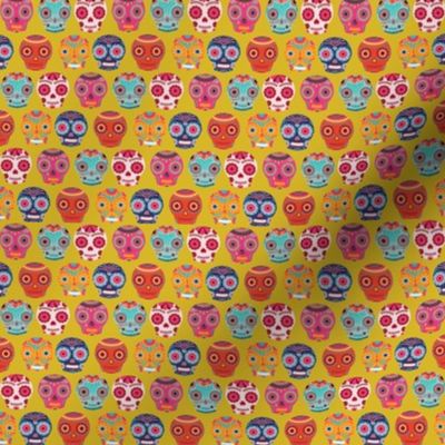 Colorful Sugar Skulls on Yellow Background