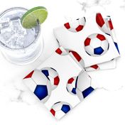 Red white and blue soccer balls on white - large