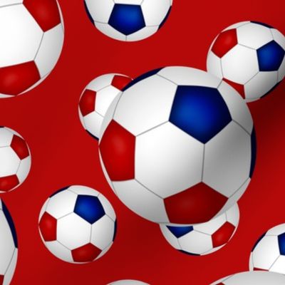 Red white and blue soccer balls on red - large