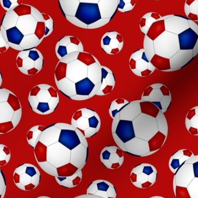 Red white and blue soccer balls on red - small