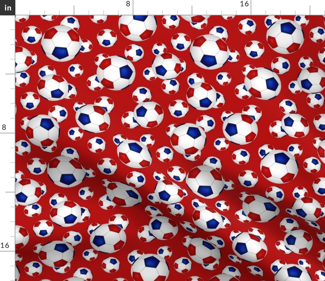 Red white and blue soccer balls on red - small