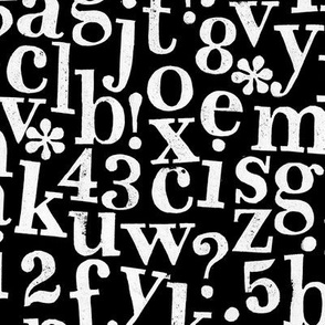 stamped alphabet - white on black