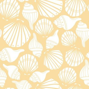 White seashells on yellow