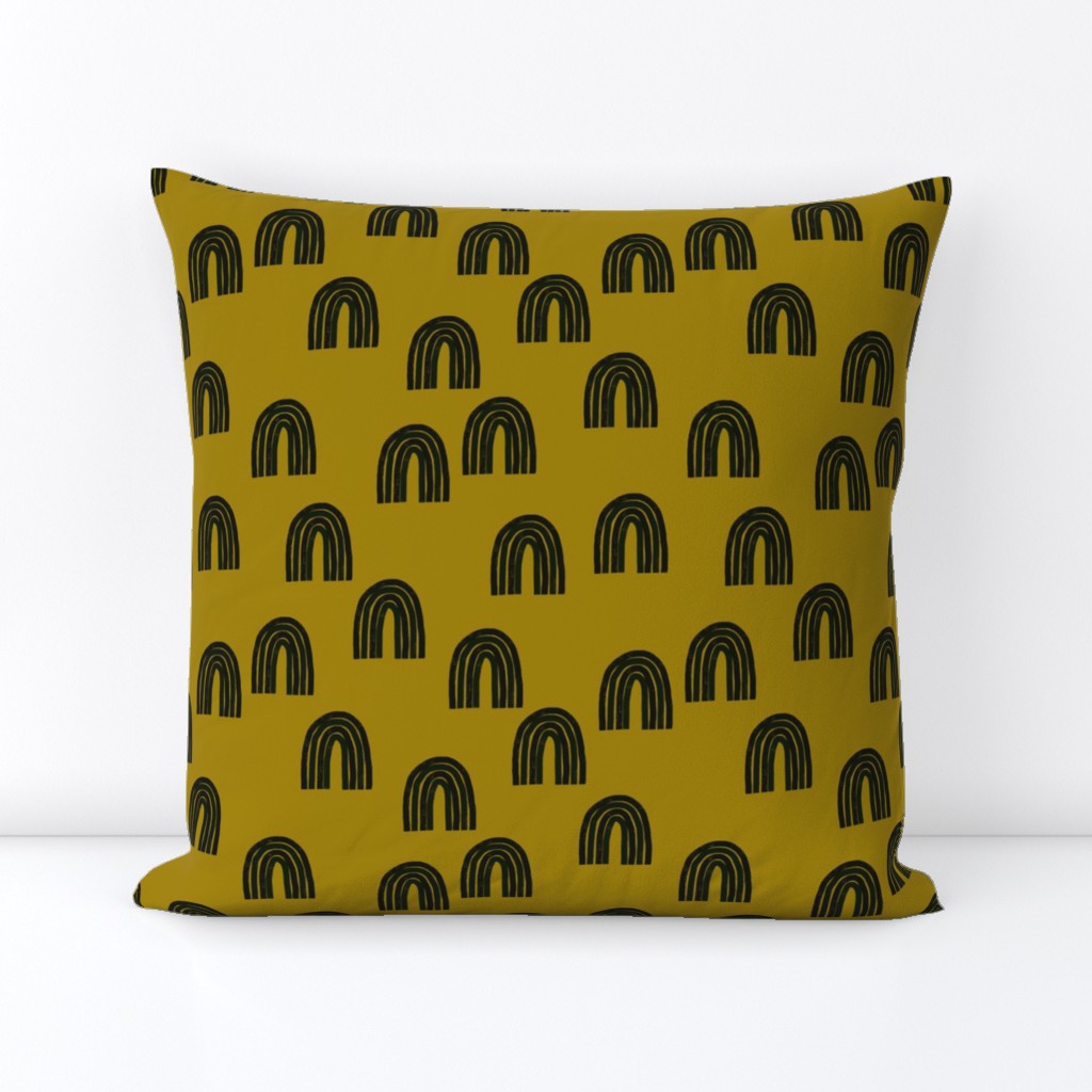 Rainbows- black on ochre green- small