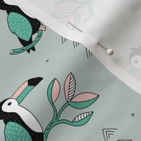 Sweet little toucan branch leaves and birds jungle green