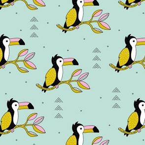 Sweet little toucan branch leaves and birds yellow pink