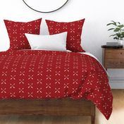 white crossed arrows on buffalo plaid red