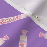 candy rolls -  tablet candy - pastel pink toss on purple - LAD19