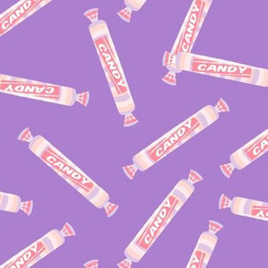 candy rolls -  tablet candy - pastel pink toss on purple - LAD19