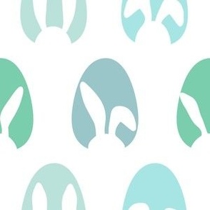 Easter Bunny Ear Silhouettes In Eggs On White