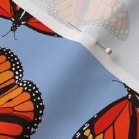 Monarch Butterflies pattern on periwinkle blue - large