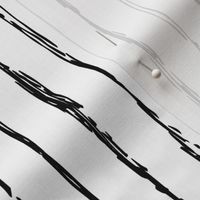 Raw vertical Inky stripes minimal Scandinavian style trend abstract print black and white monochrome