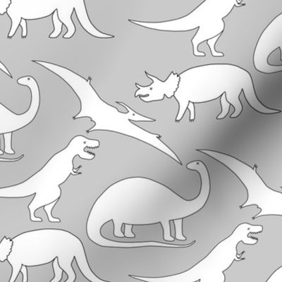 dinosaurs in white on grey