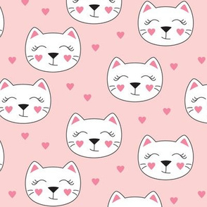 cute cat faces and hearts on pink