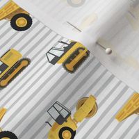 construction trucks - yellow on grey stripes - LAD19