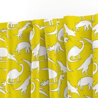 dinosaurs in white on mustard yellow