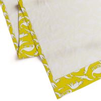 dinosaurs in white on mustard yellow