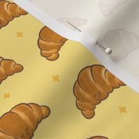 Happy Sleepy Kawaii Croissants on Yellow