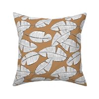 Lush leaves palm tree leaf garden tropical summer vibes and surf beach dreams caramel brown