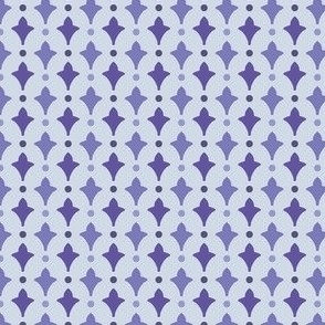 Fleur de lys with polka dots in bluish purple