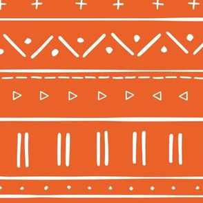 2 // african inspired mudcloth fabric wallpaper gift wrap mud cloth fabric tangerine clementine orange and white