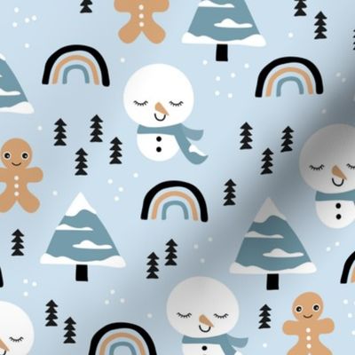 Little winter rainbows and snowy snowman and gingerbread men pine trees christmas holiday blue caramel boys