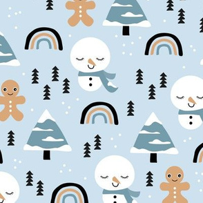 Little winter rainbows and snowy snowman and gingerbread men pine trees christmas holiday blue caramel boys