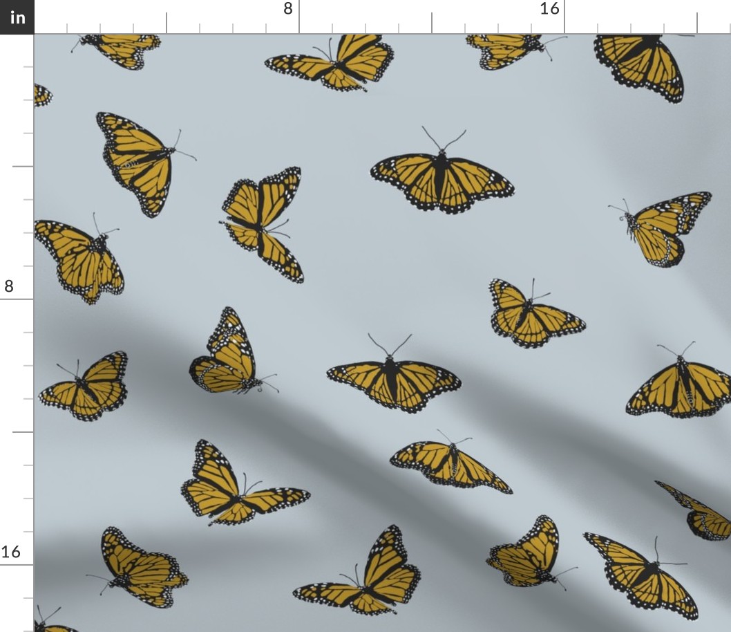 Golden Monarch Butterflies on Grey