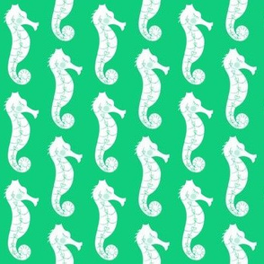 seahorses on green