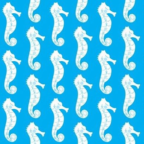 seahorses on blue