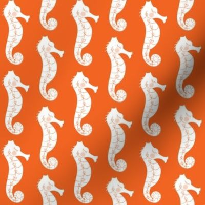 seahorses on orange