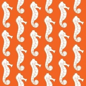 seahorses on orange