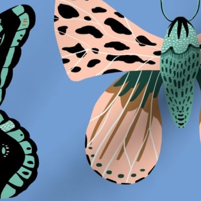 Pretty Moths -  Larger Scale on Blue background