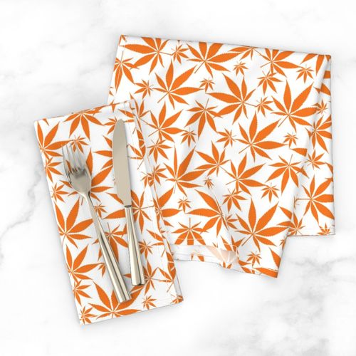 Cannabis leaves - orange on white