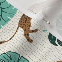 leopard and monstera leaves