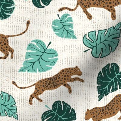 leopard and monstera leaves