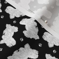 Tiny Trotting Coton de Tulear and paw prints - black
